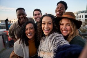 Diverse group of friends taking a selfie