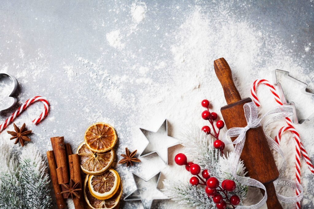 Baking tools, candy canes, and cinnamon sticks